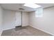 Finished basement room with exterior access and neutral decor at 1278 Lynwyn Se Ln, Atlanta, GA 30316