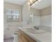 Bathroom with hexagon tile floor, vanity, and toilet at 1800 Trophy Dr, Marietta, GA 30062