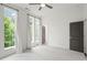 Bright bedroom with large windows and plush carpeting at 201 Devore Rd, Alpharetta, GA 30009