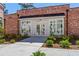 Brick building with white trim and landscaping at 201 Devore Rd, Alpharetta, GA 30009