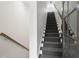 Modern staircase leading to upper levels at 201 Devore Rd, Alpharetta, GA 30009