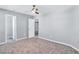 Spacious bedroom with ceiling fan and carpet at 116 Paulownia Cir, Mcdonough, GA 30253