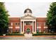 Snellville City Hall, a brick building with a clock tower at 4301 Portsbrook Ave, Snellville, GA 30039