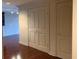 Hallway with hardwood floors and neutral-toned walls at 195 14Th Ne St # 2103, Atlanta, GA 30309