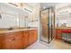 Bathroom with double vanity, granite countertops, and a large shower at 3124 Bentgrass Ln, Kennesaw, GA 30144