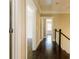 Bright hallway with dark hardwood floors and white doors at 343 Sterling St, Atlanta, GA 30307