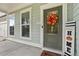 Inviting front door with fall wreath and welcome sign at 6172 Collins Nw Rd, Acworth, GA 30101