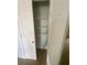 Empty closet with wire shelving and carpet at 2080 Winding Crossing Trl, Fairburn, GA 30213