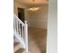 Dining room with chandelier and neutral colored carpeting at 2080 Winding Crossing Trl, Fairburn, GA 30213