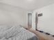 Spacious bedroom with a large bed and access to another room at 719 Sara Meadow Rd, Loganville, GA 30052