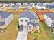 Aerial view of house and surrounding neighborhood at 719 Sara Meadow Rd, Loganville, GA 30052