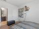 Bright bedroom with double doors and a view of the bathroom at 719 Sara Meadow Rd, Loganville, GA 30052