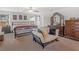 Spacious main bedroom with a king-size bed and ample closet space at 719 Sara Meadow Rd, Loganville, GA 30052