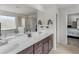 Double vanity bathroom with a soaking tub and walk-in shower at 719 Sara Meadow Rd, Loganville, GA 30052