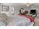 Main bedroom with king-size bed and access to the bathroom at 719 Sara Meadow Rd, Loganville, GA 30052