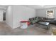 Spacious bonus room with sectional sofa and window at 719 Sara Meadow Rd, Loganville, GA 30052