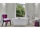 Spa-like bathroom with freestanding tub and natural light at 2000 Enon Sw Rd, Atlanta, GA 30331