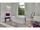 Bathroom with soaking tub, window, and modern finishes at 2000 Enon Sw Rd, Atlanta, GA 30331