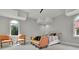 Large bedroom with two armchairs and a chaise lounge at 2000 Enon Sw Rd, Atlanta, GA 30331