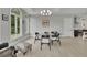 Bright dining area with a glass-top table and comfortable seating at 2000 Enon Sw Rd, Atlanta, GA 30331
