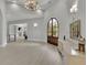 Spacious entryway with hardwood floors, chandelier and console table at 2000 Enon Sw Rd, Atlanta, GA 30331