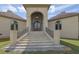 Elegant front entrance with brick stairs and arched entryway at 2000 Enon Sw Rd, Atlanta, GA 30331