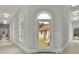 Light-filled hallway with view of backyard and access to other rooms at 2000 Enon Sw Rd, Atlanta, GA 30331
