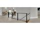 Modern staircase with metal railing and light colored floors at 2000 Enon Sw Rd, Atlanta, GA 30331