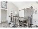 Dining area with rustic farmhouse table and sliding barn door at 1355 Nebo Rd, Dallas, GA 30157