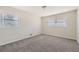 Spacious bedroom with neutral wall colors and grey carpeting at 3189 Dogwood Dr, Atlanta, GA 30344