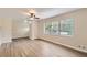 Bright living room with hardwood floors and ceiling fan at 3189 Dogwood Dr, Atlanta, GA 30344