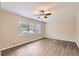 Spacious living room with hardwood floors and large window at 3189 Dogwood Dr, Atlanta, GA 30344