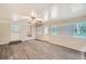 Sunroom features wood-look floors, multiple windows and ceiling fan at 3189 Dogwood Dr, Atlanta, GA 30344