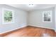 Bright bedroom with hardwood floors and large windows offering natural light at 2079 Pinehurst Rd, Snellville, GA 30078