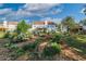 Large backyard with established garden and deck at 4069 High Country Dr, Douglasville, GA 30135