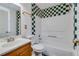 Basement bathroom with green and white checkered tile at 4069 High Country Dr, Douglasville, GA 30135