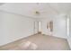 Large main bedroom with access to bathroom and carpet flooring at 4069 High Country Dr, Douglasville, GA 30135