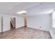 Spacious basement with light wood flooring and plenty of natural light at 4069 High Country Dr, Douglasville, GA 30135