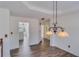 Spacious dining room featuring hardwood floors and a chandelier at 4069 High Country Dr, Douglasville, GA 30135