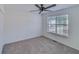 Charming bedroom with carpet floors and a large window at 4069 High Country Dr, Douglasville, GA 30135