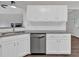Modern kitchen with white cabinets and granite countertops at 4050 Harvest Ridge Dr, Douglasville, GA 30135
