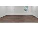 Spacious finished basement with dark brown flooring and neutral walls at 4050 Harvest Ridge Dr, Douglasville, GA 30135