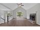 Spacious living room with vaulted ceiling, fireplace, and hardwood floors at 4050 Harvest Ridge Dr, Douglasville, GA 30135