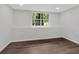 Finished basement room with wood-look floors and window at 4050 Harvest Ridge Dr, Douglasville, GA 30135