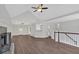 Spacious living room with vaulted ceiling, fireplace, and hardwood floors at 4050 Harvest Ridge Dr, Douglasville, GA 30135