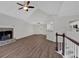 Spacious living room with vaulted ceiling, fireplace, and hardwood floors at 4050 Harvest Ridge Dr, Douglasville, GA 30135