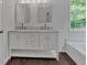 Bathroom with double vanity and large mirrors at 4050 Harvest Ridge Dr, Douglasville, GA 30135