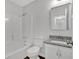Simple bathroom with shower/tub combo and granite vanity at 4050 Harvest Ridge Dr, Douglasville, GA 30135