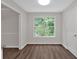 Bright dining area with hardwood floors and large window at 4050 Harvest Ridge Dr, Douglasville, GA 30135