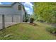 Gray house with two-car garage and fenced backyard at 4050 Harvest Ridge Dr, Douglasville, GA 30135